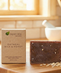 Oatmeal, Milk & Honey - Bar Soap with natural exfoliating oats on wooden surface in warm natural light