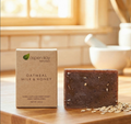 Oatmeal, Milk & Honey - Bar Soap with natural exfoliating oats on wooden surface in warm natural light