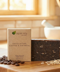 Exfoliating Coffee & Oatmeal - Bar Soap with coffee beans and oatmeal flakes on wooden surface by window light