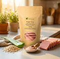 Aloe & Oatmeal with Calamine Fugly Soap bar slices with aloe leaf, oatmeal, and calamine powder in a natural light setting